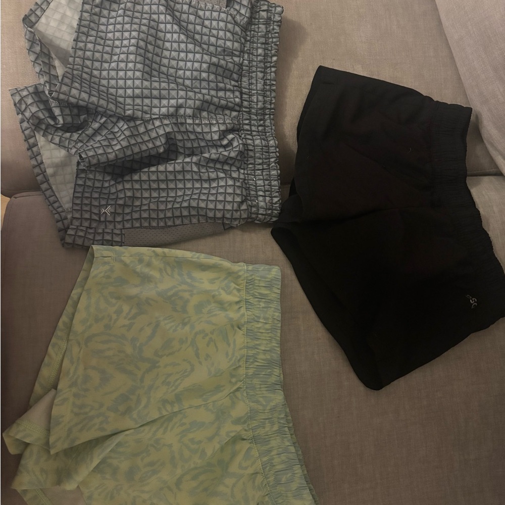 DSG Kids Shorts Trio - Black, Blue, Light Green. 2 are DSG third is Xersion.